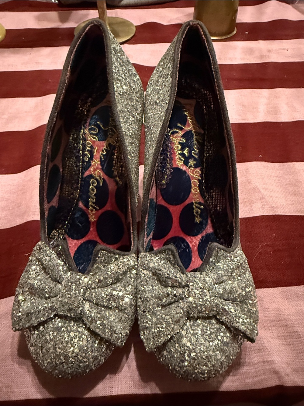 Irregular Choice silver glitter heels with bow